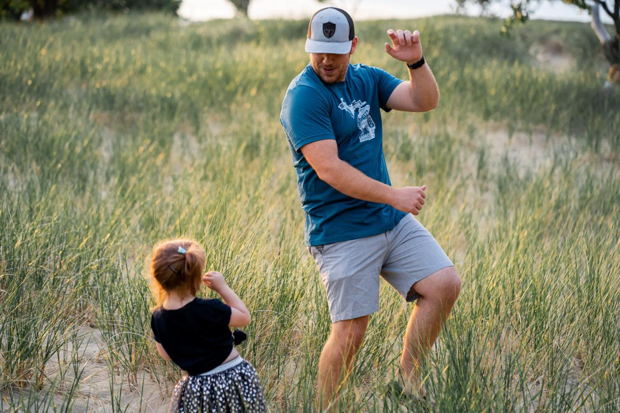 A father and his daughter dancing