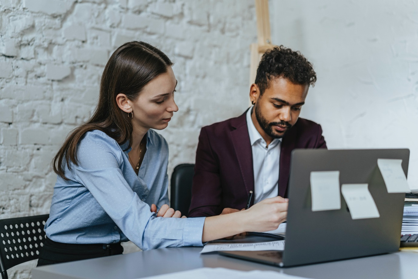 An immigration lawyer meeting with client