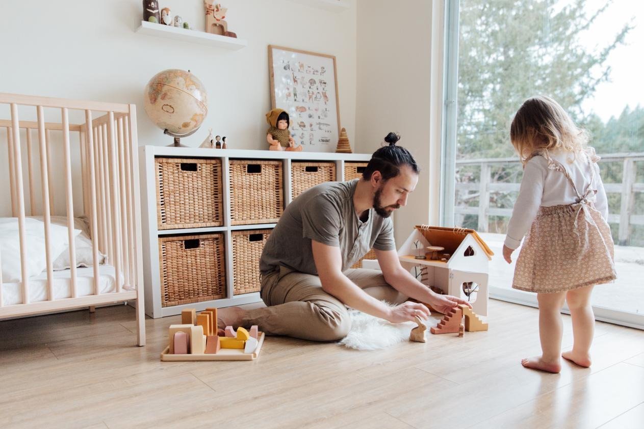 A father playing with his daughter