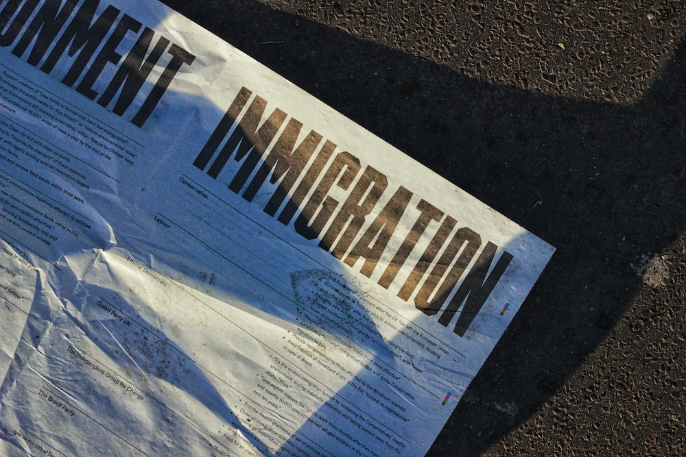 crumpled immigration documentation