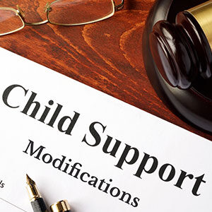  Legal documents signifying child support modification proceedings.