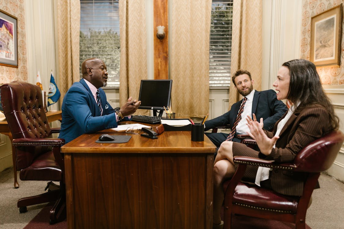 A couple talking to a common law divorce attorney