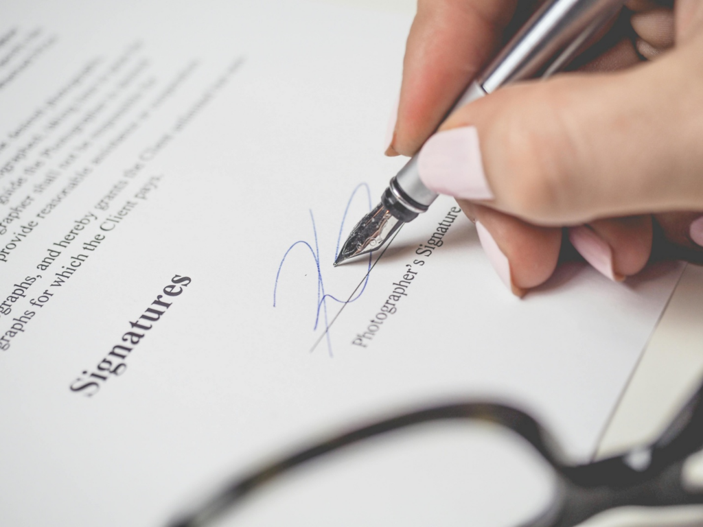 A person signing a document