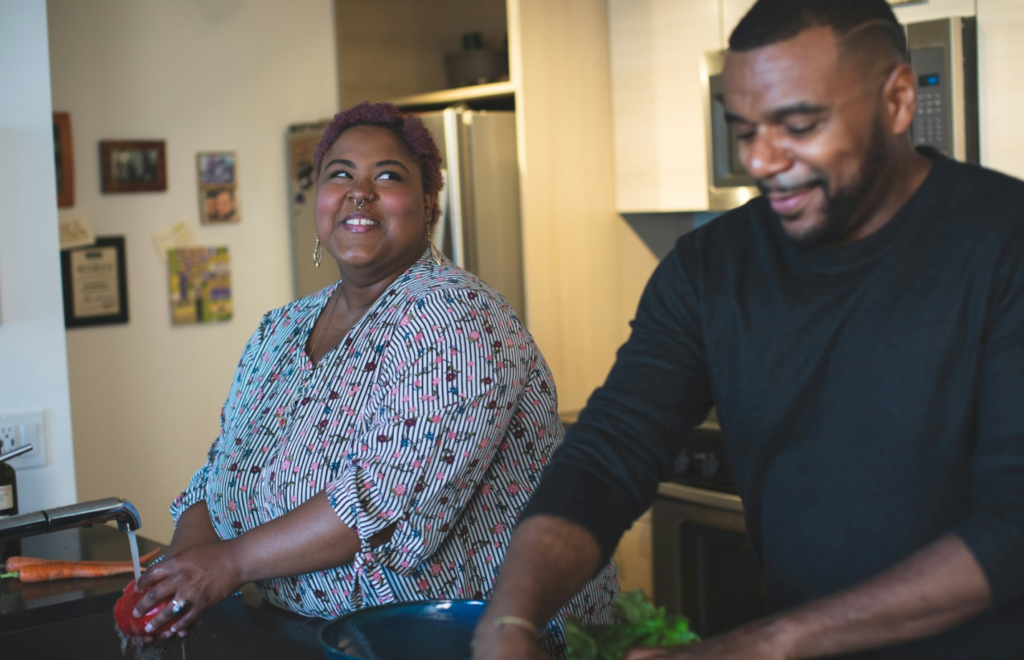 A couple doing dishes together