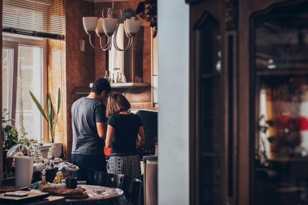 A couple preparing a meal together