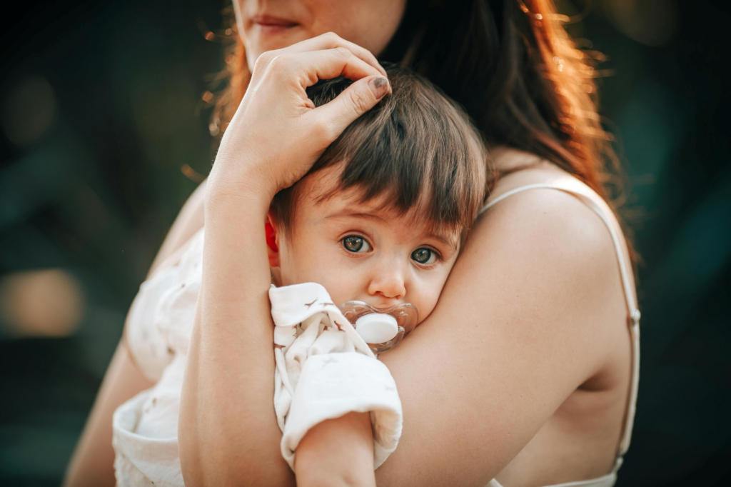 A mother holding her child